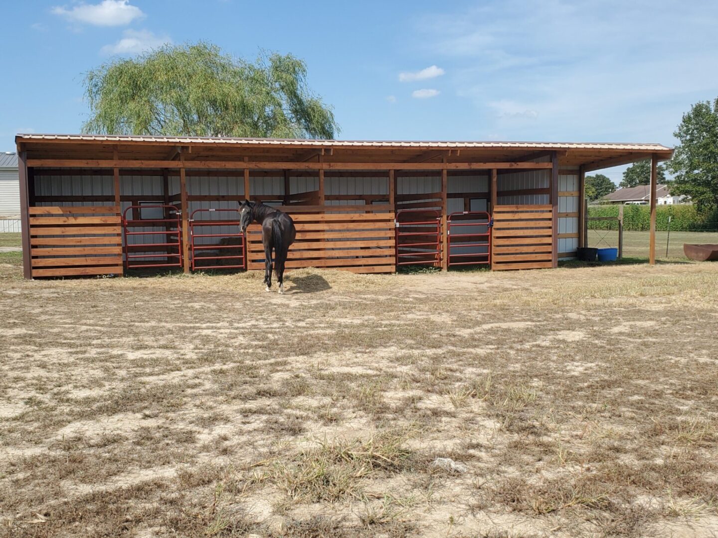 Horse stables in a field